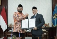 Bupati Halsel Bassam Kasuba dan Walikota Surabaya Eri Cahyadi (foto//sadam)