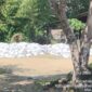 Barang bukti ribuan karung berisi tanah Topsoil ilegal yang dikomersilkan. foto Sadam Hadi|Segmen